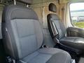 Interior view of a 2021 RAM Promaster showing two fabric-covered front seats designed for comfort and support