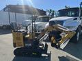 A 2024 AGT Mini Excavator in yellow with a black track system featuring a front bucket and an enclosed operator cabin labeled H12R