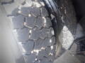Close-up view of the rugged tire tread of a 2016 International WorkStar 7500 showcasing deep grooves and rough texture designed for durability on various terrains