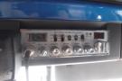 A Cobra 29 NW LTD Classic CB radio with various control knobs and a display showing a channel number