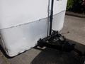 A 2004 Royal 18 Foot Office Trailer with a metal diamond plate lower section and a hitch connection on the front