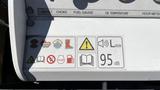 Control panel of a 2024 JQ Power J Q 400 Stand Up featuring various operational symbols including fuel gauge oil temperature and safety warnings