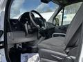 2017 Mercedes-Benz Sprinter interior showing the driver's seat steering wheel and dashboard with various controls and a floor mat