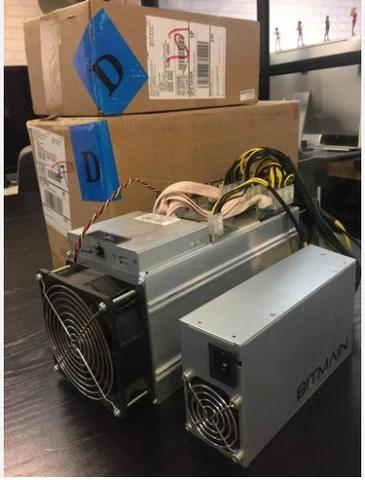 Original Bitmain KS3 and GoldShell AL Box Antminers with power cords and fans visible in the foreground