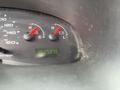Dashboard of a 2008 Ford Econoline showing gauges for temperature and battery along with an odometer reading of 162927.5 miles