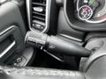 Close-up of the control stalk on the steering column of a 2020 RAM 3500 featuring wiper and headlight functions