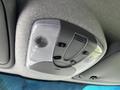 Interior overhead console of a 2012 Mercedes-Benz Sprinter featuring lights and control buttons for convenience functions