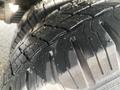 Close-up of a tire tread on a 2018 Chevrolet Express showing detailed grooves and patterns on the rubber surface