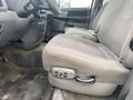 2008 Dodge Ram 5500 front bench seat with gray upholstery featuring controls for seat adjustment