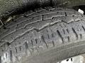 Close-up of a worn tire tread on a 2012 Mercedes-Benz Sprinter with visible cracks and grooves