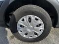 Close-up of a silver wheel and tire from a 2017 Ford Transit featuring a distinctive design with multiple spokes and a Continental brand tire