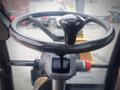 Steering wheel of a 2014 John Deere 190D W