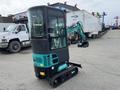 2024 AGT Industrial Green QH13R Mini Excavator with a compact design tracks and a clear glass cab showcasing operator controls and a boom arm with a bucket attached